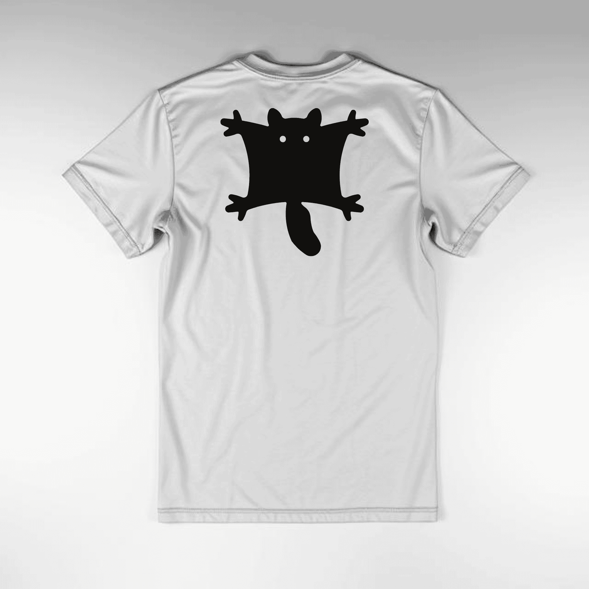 White t-shirt with a black flying sqirrel graphic on a gray shirt
